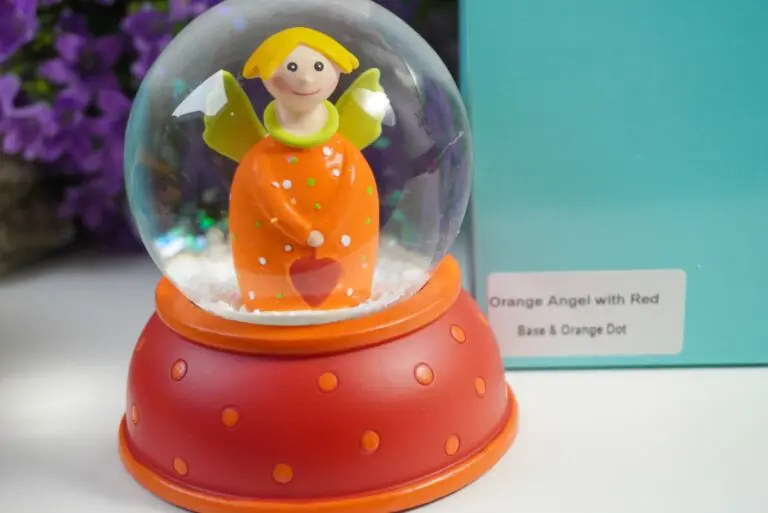 Pape Schneekugel Glimmerkugel Schutzengel Orange Angel with Red Base & Orange Dot