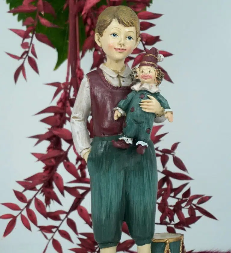 Dekofigur Clayre & Eef Jungen Figur mit Clown Puppe