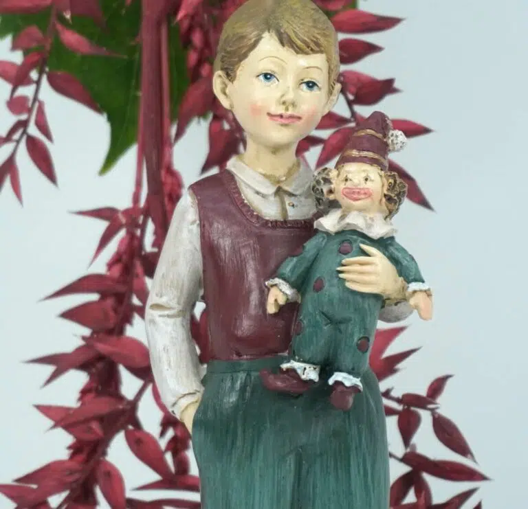 Dekofigur Clayre & Eef Jungen Figur mit Clown Puppe